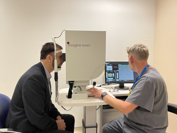 Mr Afzal Khan, MP with Mr Darren Hargreaves, Research Ophthalmic Science Practitioner at Manchester Royal Eye Hospital